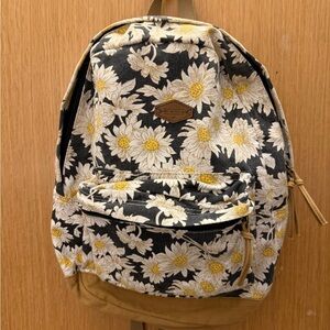 O'Neill Black Canvas Backpack with White and Yellow Daisy Print and Tan Base